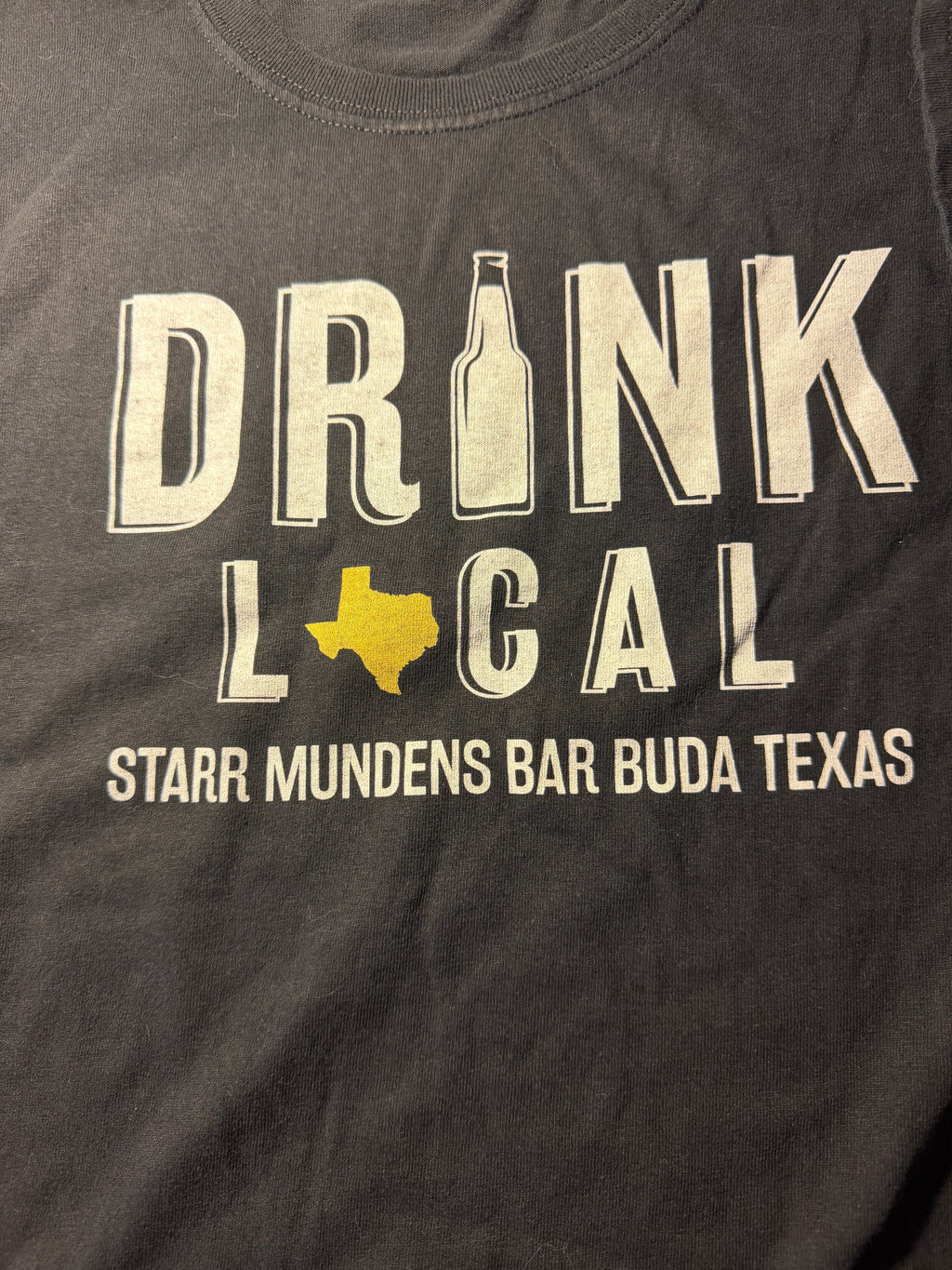 "Drink Local" Starr Mundens Bar Buda Texas Graphic Tee – Gildan XL