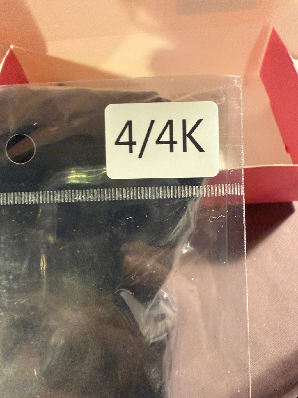 Hair extensions bag marked shade 4/4K