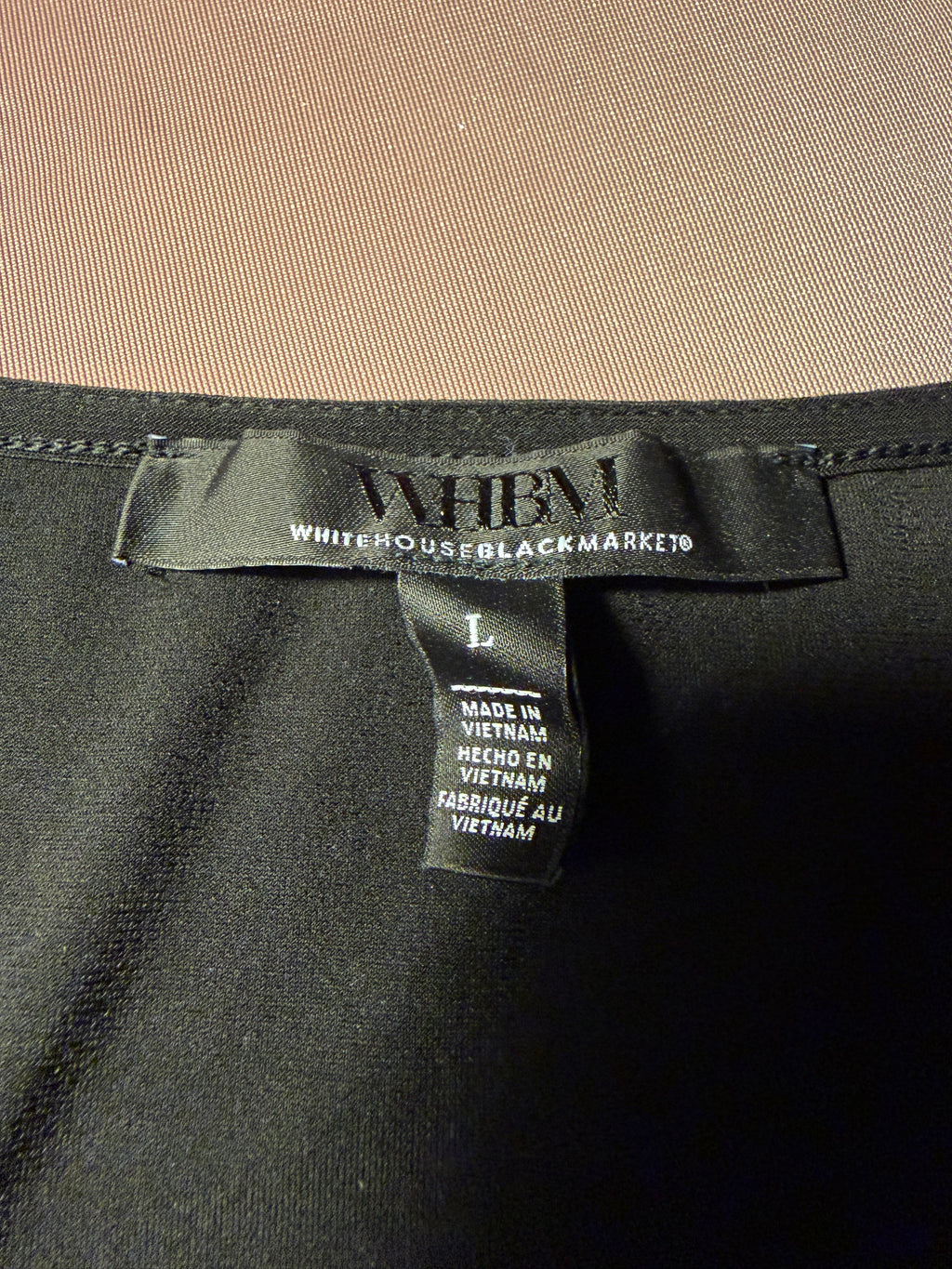 WHBM Black Sleeveless Peplum Top with Gold Ring Detail