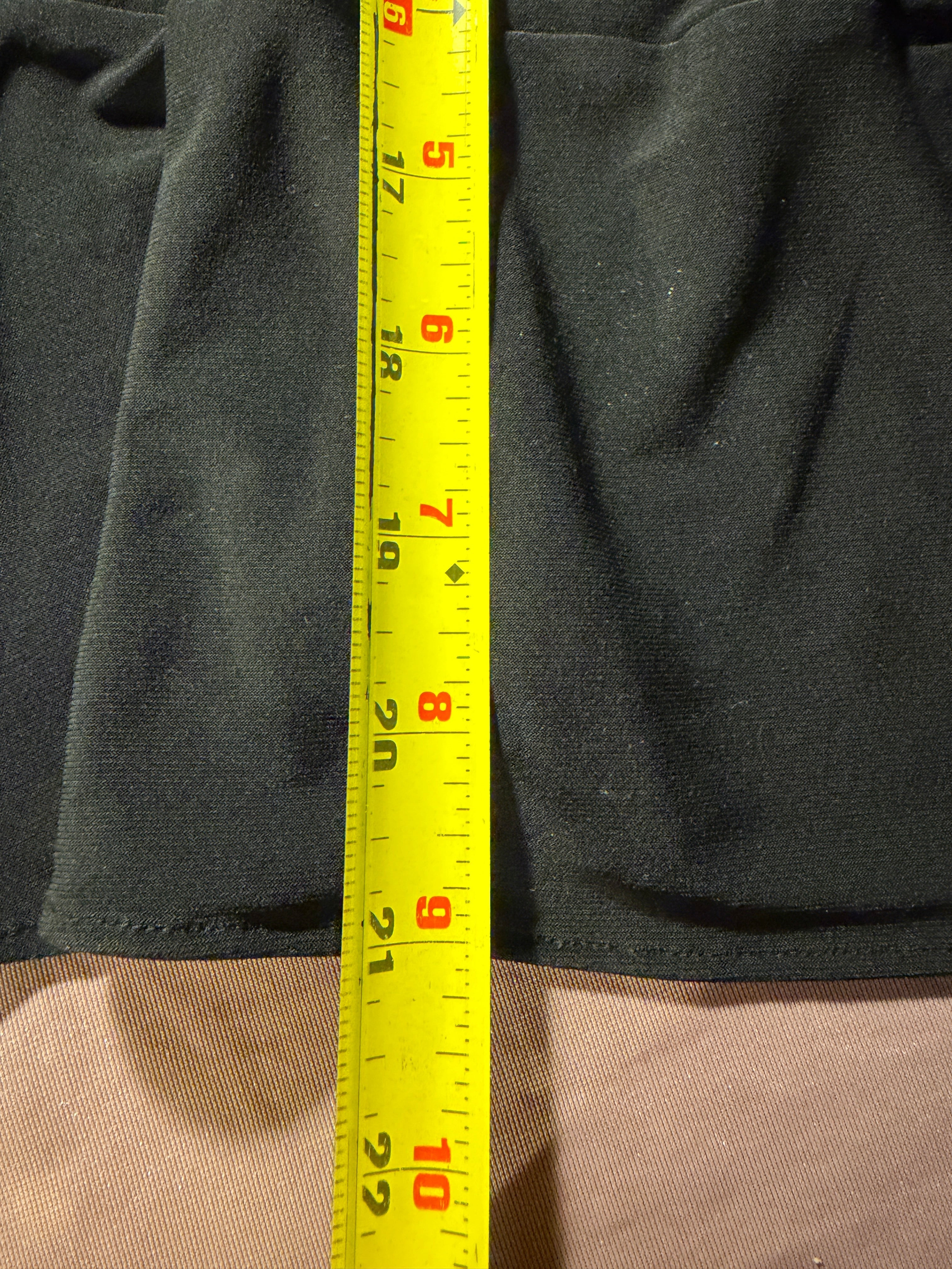 WHBM Black Sleeveless Peplum Top with Gold Ring Detail
